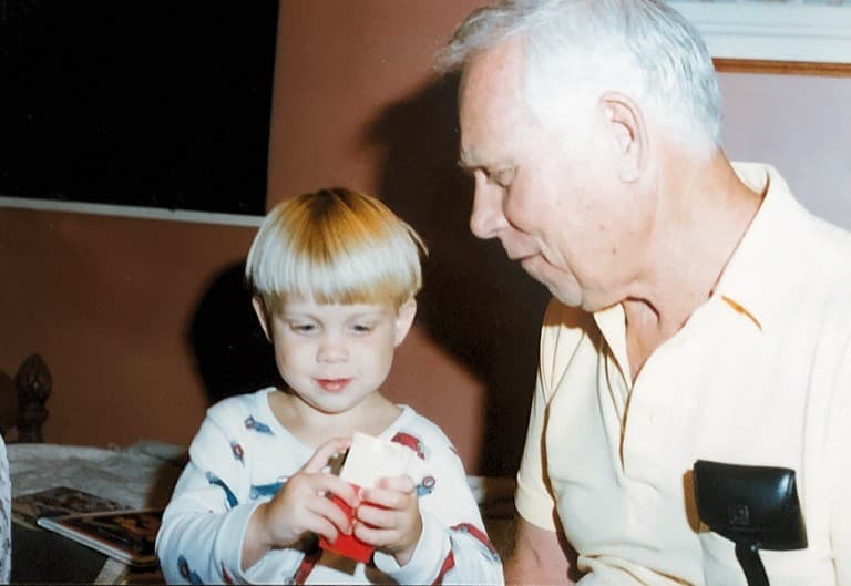 Andy shows PawPaw his flashlight - best toy ever!