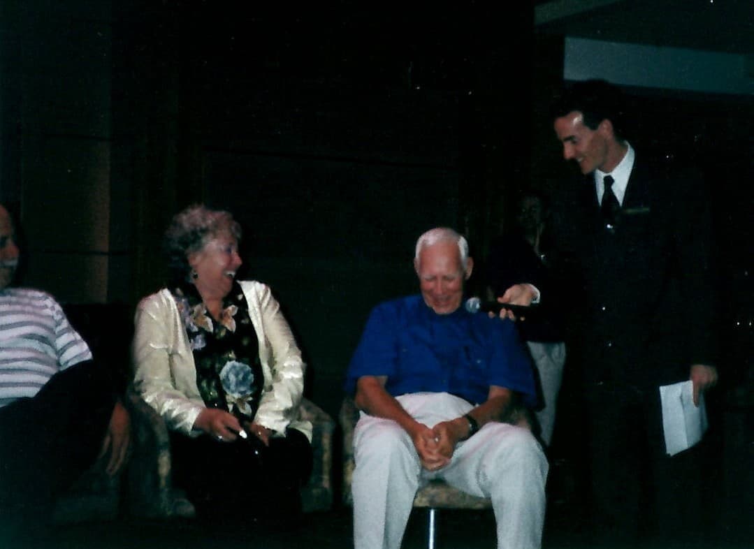Barbara & Frank playing games on their cruise June 2003